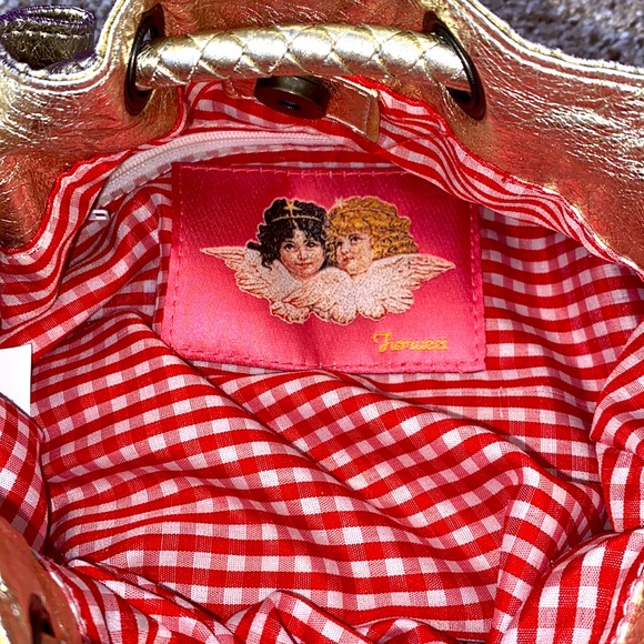 Fionucci bag shell :100% polyurethane lining:100% polyester.Button to close. - Picture 5 of 5